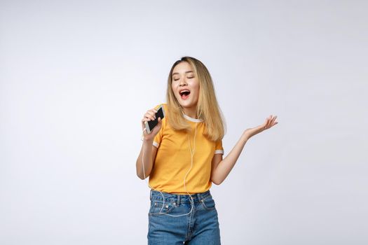 Beautiful asian woman sing a song, portrait studio on white background