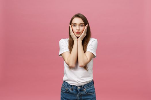 Portrait of crazy adorable young woman playing with her hairs. emotional girl isolated on white background.