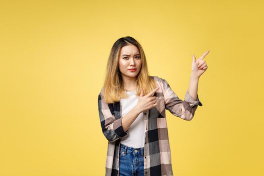 young attractive asian woman who points to the finger with unhappy emotion