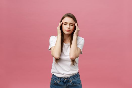 girl suffers from terrible headaches and compresses the head with fingers. Forget and remember something, suffer from illness.