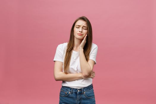 Young caucasian woman over isolated background touching mouth with hand with painful expression because of toothache. Dentist concept.