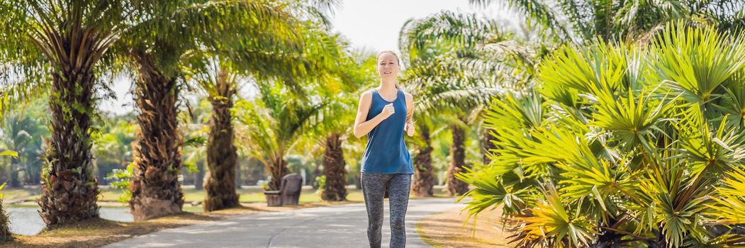 Runner athlete running at tropical park. woman fitness sunrise jogging workout wellness concept. BANNER, LONG FORMAT