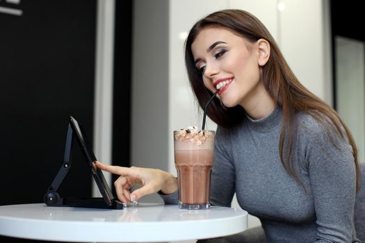 Smiling Woman with Coffee Frappe Drink at the Restaurant - Portrait of a beautiful girl with frappuccino