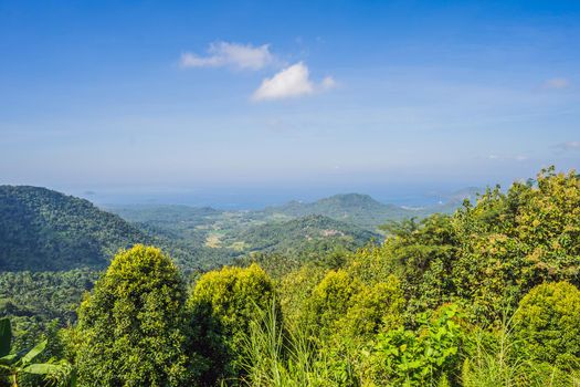 One of the main popular attractions of tropical island Bali visited daily by hundreds of tourists from around the world for look amazing scenic top view, two lakes Batur and Batur volcano Indonesia.