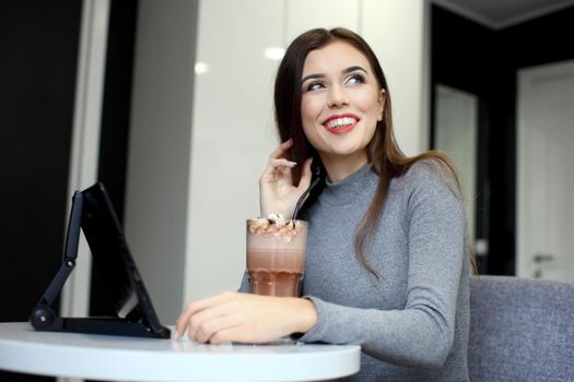 Smiling Woman with Coffee Frappe Drink at the Restaurant - Portrait of a beautiful girl with frappuccino