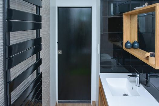 Bathroom in a house. Black wood style