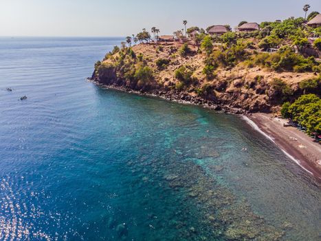 Jemeluk Bay, Amed. Amed is fast becoming a popular tourist destination in Bali, Indonesia. Set in the North-East of Bali, it is a home to excellent snorkeling, scuba diving, freediving and yoga.