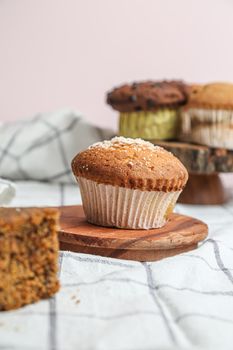 Chocolate muffin and walnut muffin, homemade bakery on white background