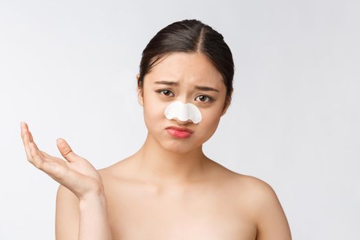 Cosmetology. Portrait Of Beautiful Female Asian Model With Mask On Nose. Closeup Of Healthy Young Woman With Pure Soft Skin And Fresh Natural Makeup