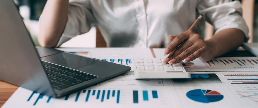 accountant woman working on desk business finance and accounting.