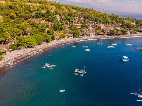 Jemeluk Bay, Amed. Amed is fast becoming a popular tourist destination in Bali, Indonesia. Set in the North-East of Bali, it is a home to excellent snorkeling, scuba diving, freediving and yoga.