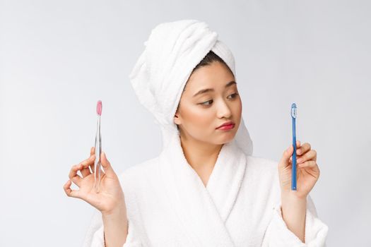 Close up of Smile woman brush teeth. great for health dental care concept, Isolated over white background. asian