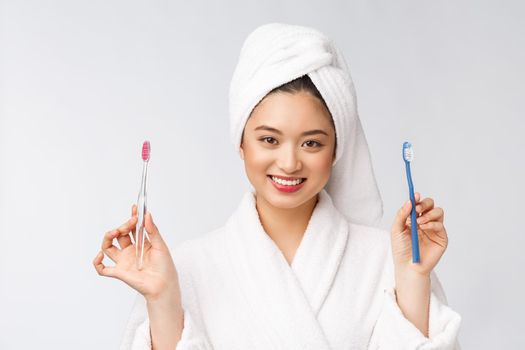 Close up of Smile woman brush teeth. great for health dental care concept, Isolated over white background. asian