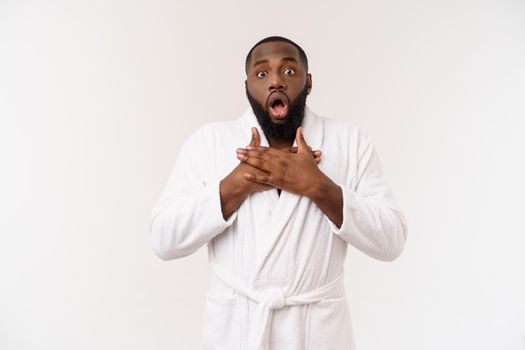 Young african american man wearing bathrobe over isolated white background thinking looking tired and bored with depression problems