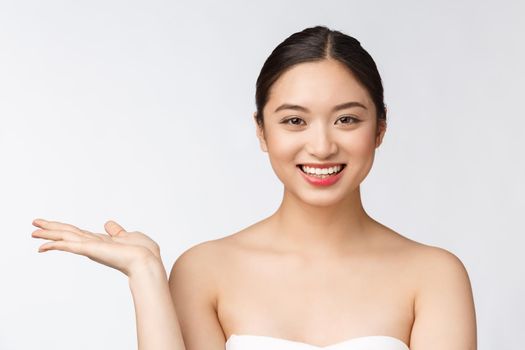 Beautiful smiling woman isolated on white background. Closeup lady portrait looking happy