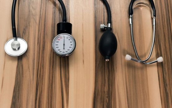 Cardiology. Tonometer and a manometer, stethoscope for diagnosis to measure of blood pressure and pulse.