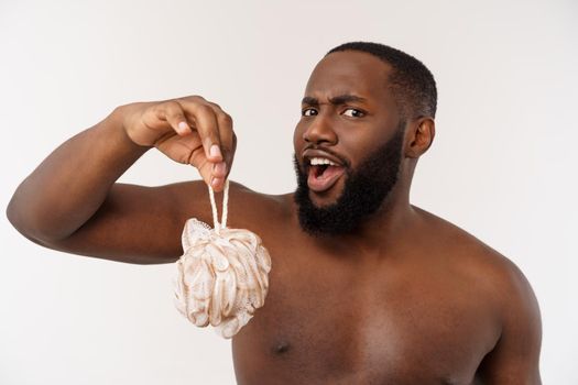 An african-american prepare for taking a shower, isolated on white background.