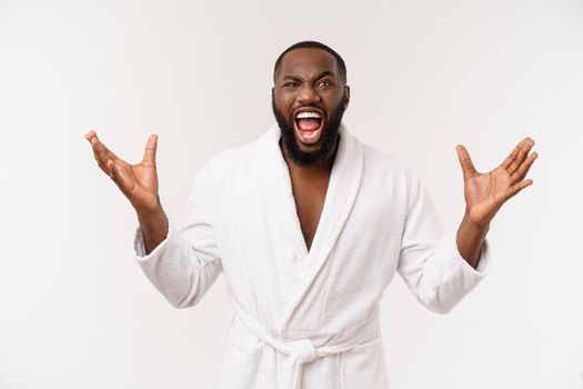 Young african american man wearing bathrobe over isolated white background thinking looking tired and bored with depression problems