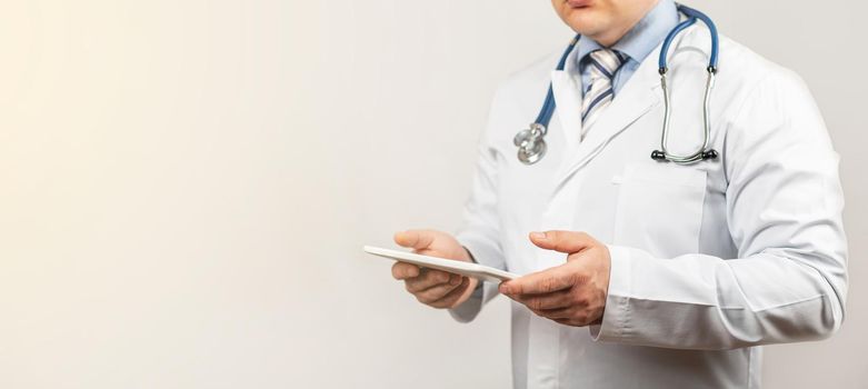 Doctor using a tablet and check with the analysis of the DNA chromosome of a genetic person on a virtual interface. Medicine. Medical science and biotechnology