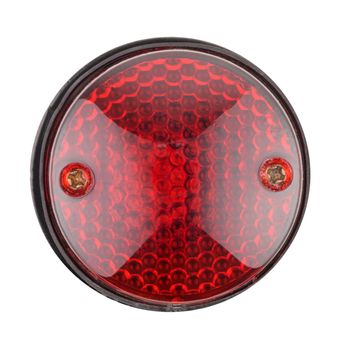 Motorcycle rear red brake light isolated on white background.