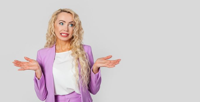 Frustrated woman, upset, bewildered Caucasian pretty blond woman shrugs, arms outstretched, complete disbelief to doubt that the answer has no idea. I dont know.