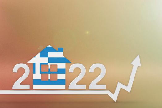 The cost of real estate in Greece in 2022. Rising cost of construction, insurance, rent in Greece. House model painted in flag colors, up arrow on yellow background.