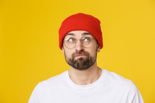 Adult hispanic man over isolated background depressed and worry for distress, angry and afraid. Sad expression.