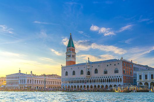 Venice cityscape with San Marco basin of Venetian lagoon water, Riva degli Schiavoni waterfront promenade, Doge's Palace Palazzo Ducale and Campanile bell tower building, Veneto Region, Italy