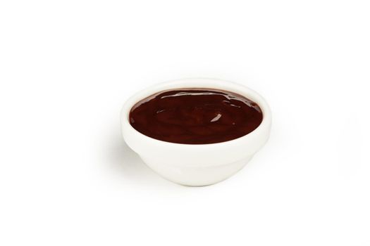 BBQ barbecue sauce in a bowl on a white background. For the restaurant menu. Traditional Japanese sushi seasoning. Healthy eating