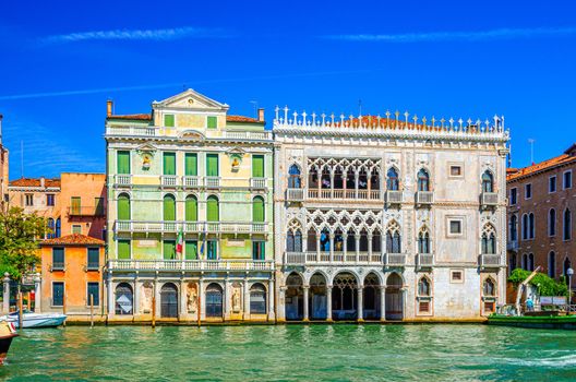 Palazzo Giusti palace building in Cannaregio sestiere from Grand Canal waterway in Venice historical city centre, blue clear sky background in summer day, Veneto Region, Italy