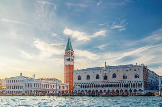 Venice cityscape with San Marco basin of Venetian lagoon water, Riva degli Schiavoni waterfront promenade, Doge's Palace Palazzo Ducale and Campanile bell tower building, Veneto Region, Italy