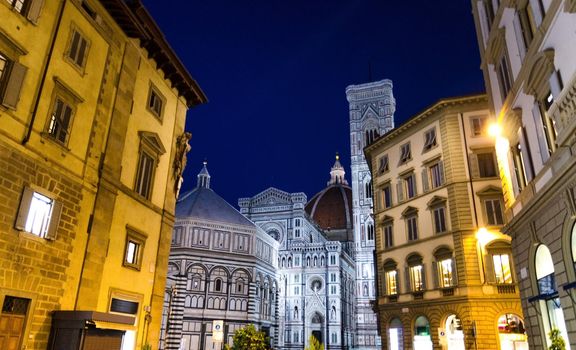 Florence Duomo, Cattedrale di Santa Maria del Fiore, Basilica of Saint Mary of the Flower Cathedral and Battistero di San Giovanni on Piazza del Duomo square in the evening, at night, Tuscany, Italy