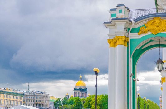 Column of The State Hermitage Museum building, The Winter Palace and Saint Isaac's Cathedral or Isaakievskiy Sobor museum background, Saint Petersburg Leningrad city, Russia