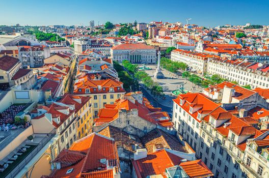 Aerial panoramic view of Lisboa historical city centre Baixa Pombalina Downtown with Rossio King Pedro IV Square Praca Dom Pedro IV, Queen Maria II National Theatre and Column of Pedro IV, Portugal