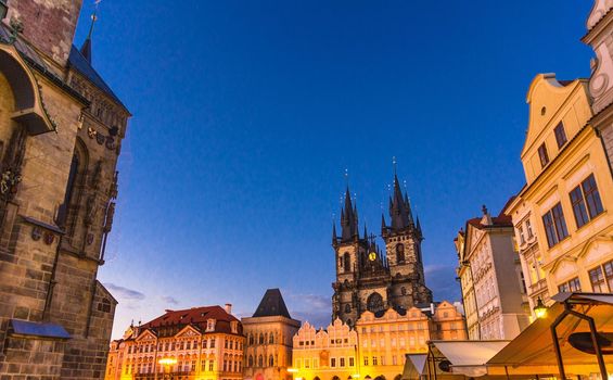 Prague Old Town Square Stare Mesto historical city centre with Astronomical Clock Orloj of City Hall, Stone Bell House, Gothic Church of Our Lady before Tyn, evening view, Bohemia, Czech Republic