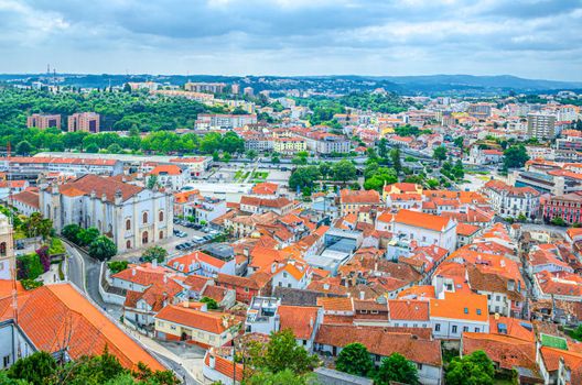 Aerial panoramic view of Leiria city old historical centre with red tiled roofs buildings and Our Lady of the Immaculate Conception Cathedral catholic church, Centro Region, Portugal