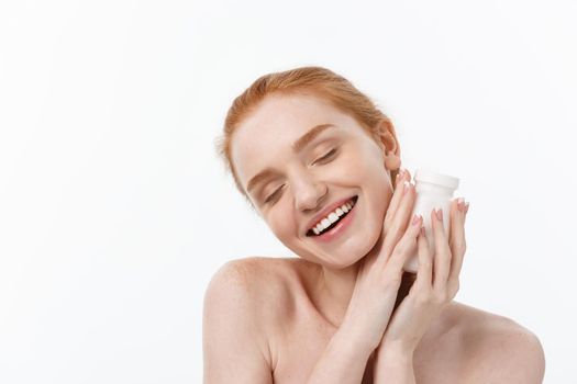 Beautiful Smiling Girl Taking Medication, Holding Bottle With Pills. Healthy Happy Female Eating Pill.Vitamins And Supplements,Diet Nutrition Concept