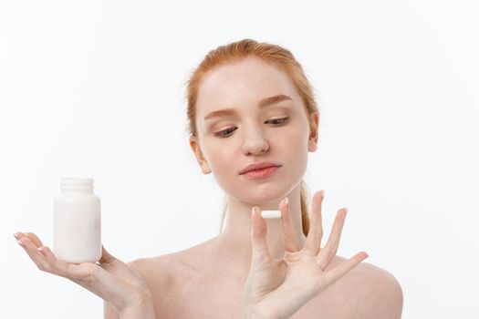 Beautiful Smiling Girl Taking Medication, Holding Bottle With Pills. Healthy Happy Female Eating Pill.Vitamins And Supplements,Diet Nutrition Concept