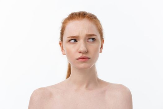 Close-up portrait of beautiful, fresh, healthy and sensual girl over white background.