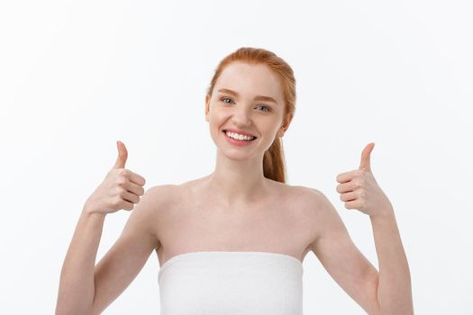 Portrait of Beauty woman showing good sign with finger , thumbs up gesture. Beautiful adult woman with clean fresh skin on white background.