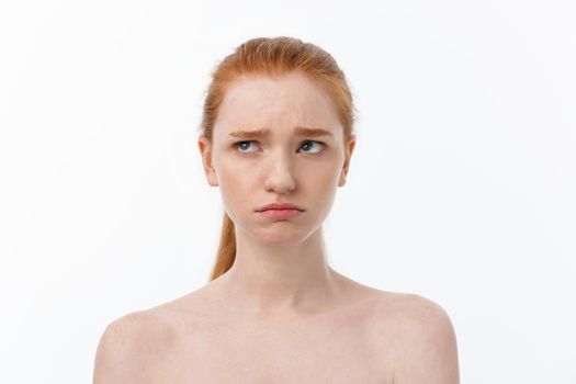 Close-up portrait of beautiful, fresh, healthy and sensual girl over white background.