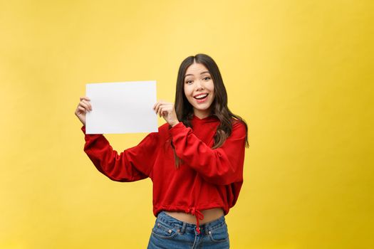 Asian young woman holding blank board or paper.