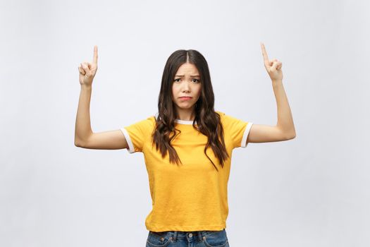 young attractive asian woman who points to the finger with unhappy emotion