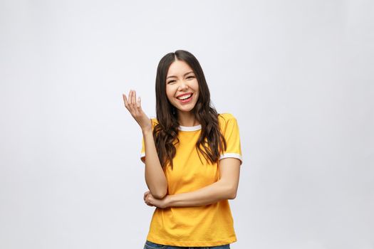 Young friendly Asian woman with smiley face isolated on white background.