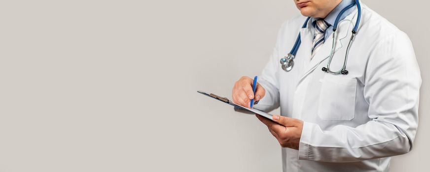 Doctor using a tablet and check with the analysis of the DNA chromosome of a genetic person on a virtual interface. Medicine. Medical science and biotechnology