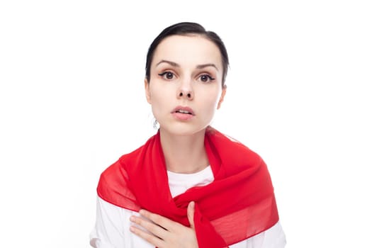 woman in white with a red scarf on her shoulders, white background. High quality photo