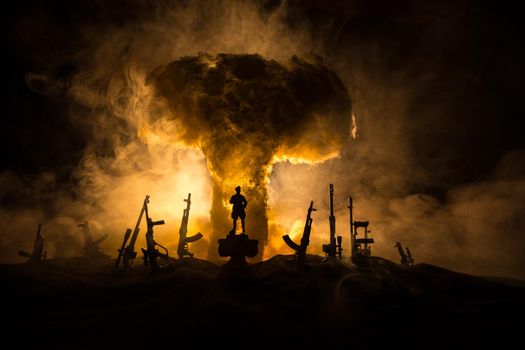 Creative artwork decoration - Russian war in Ukraine concept. Road and giant weapons with giant explosion of nuclear bomb. Selective focus
