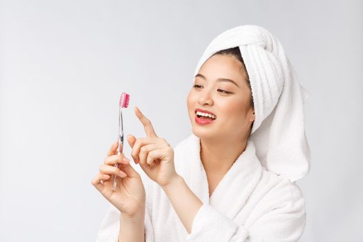 Close up of Smile woman brush teeth. great for health dental care concept, Isolated over white background. asian