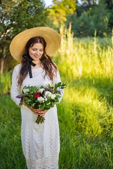 nice portrait of beautiful and young groom and bride outdoors