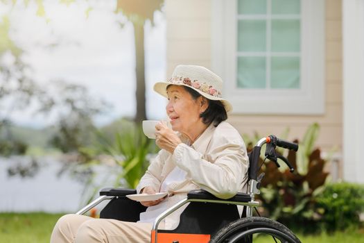 elderly woman relax in backyard